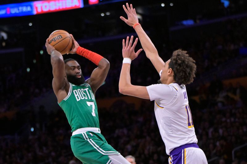 LOS ANGELES, CALIFORNIA - DECEMBER 25: Jaylen Brown #7 of the Boston Celtics drives past Jaxson Hayes #11 of the Los Angeles Lakers in the second half at Crypto.com Arena on December 25, 2023 in Los Angeles, California. NOTE TO USER: User expressly acknowledges and agrees that, by downloading and or using this photograph, User is consenting to the terms and conditions of the Getty Images License Agreement.(Photo by Jayne Kamin-Oncea/Getty Images)