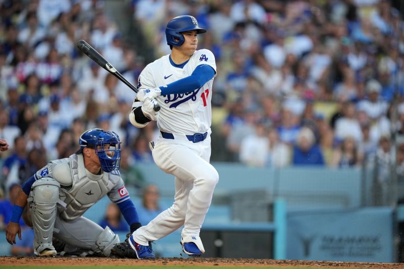 Jun 15, 2024; Los Angeles, California, USA; Los Angeles Dodgers designated hitter Shohei Ohtani (17) bats in the seventh inning against the Kansas City Royals at Dodger Stadium. Mandatory Credit: Kirby Lee-USA TODAY Sports