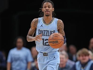 MEMPHIS, TENNESSEE - JANUARY 02: Ja Morant #12 of the Memphis Grizzlies brings the ball up court during the game against the San Antonio Spurs at FedExForum on January 02, 2024 in Memphis, Tennessee. NOTE TO USER: User expressly acknowledges and agrees that, by downloading and or using this photograph, User is consenting to the terms and conditions of the Getty Images License Agreement. (Photo by Justin Ford/Getty Images)