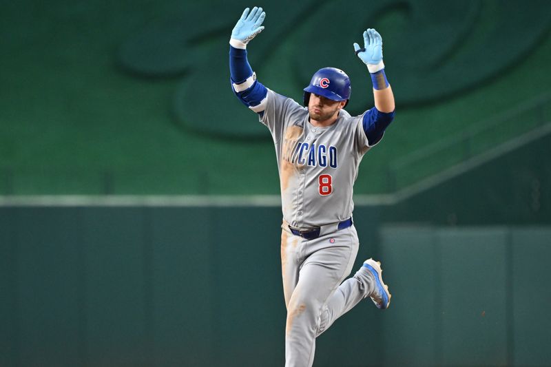 Jun 5, 2025; Washington, District of Columbia, USA; Chicago Cubs left fielder Ian Happ (8) celebrates after hitting a two-run home run during the sixth inning against the Washington Nationals at Nationals Park. Mandatory Credit: Rafael Suanes-Imagn Images