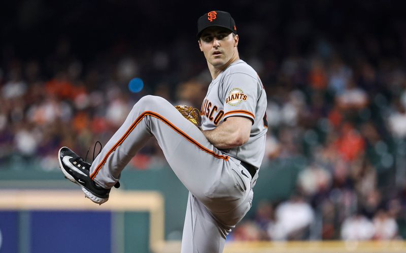 May 1, 2023; Houston, Texas, USA; San Francisco Giants starting pitcher Ross Stripling (48) delivers a pitch during the second inning against the Houston Astros at Minute Maid Park. Mandatory Credit: Troy Taormina-USA TODAY Sports