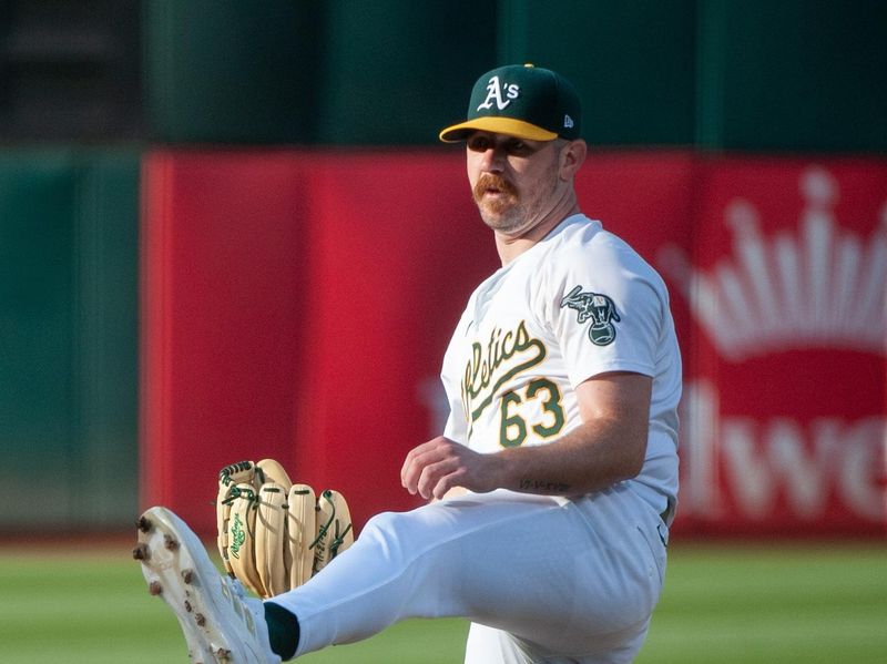 Jun 18, 2024; Oakland, California, USA; Oakland Athletics starting pitcher Hogan Harris (63) throws a pitch against the Kansas City Royals during the first inning at Oakland-Alameda County Coliseum. Mandatory Credit: Ed Szczepanski-USA TODAY Sports