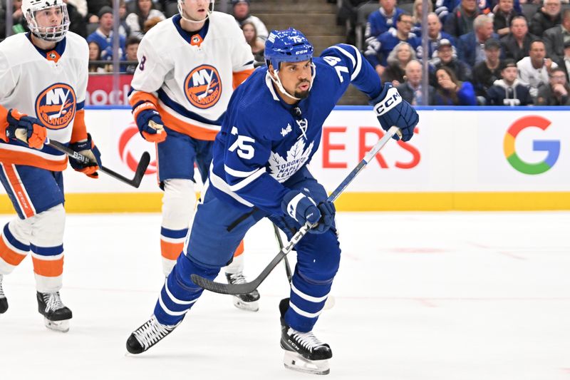 Feb 5, 2024; Toronto, Ontario, CAN;   Toronto Maple Leafs forward Ryan Reaves (75) pursues the play against the New York Islanders in the first period at Scotiabank Arena. Mandatory Credit: Dan Hamilton-USA TODAY Sports