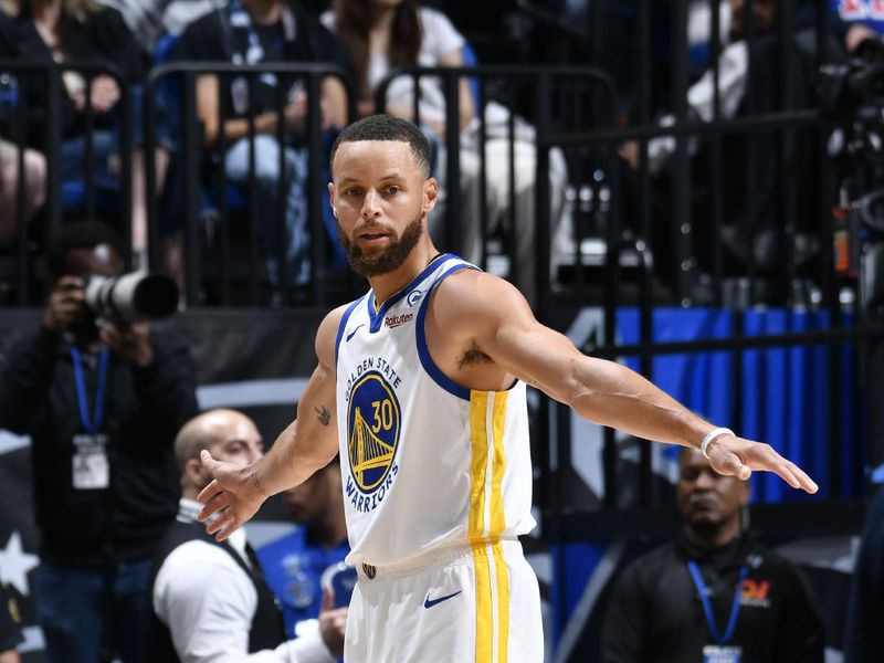 ORLANDO, FL - MARCH 27: Stephen Curry #30 of the Golden State Warriors looks on during the game against the Orlando Magic on March 27, 2024 at Amway Center in Orlando, Florida. NOTE TO USER: User expressly acknowledges and agrees that, by downloading and or using this photograph, User is consenting to the terms and conditions of the Getty Images License Agreement. Mandatory Copyright Notice: Copyright 2024 NBAE (Photo by Fernando Medina/NBAE via Getty Images)