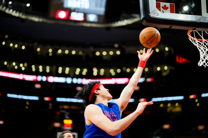 TORONTO, CANADA - DECEMBER 16: Yuta Watanabe #18 of the Brooklyn Nets warms up before the game against the Toronto Raptors on December 16, 2022 at the Scotiabank Arena in Toronto, Ontario, Canada.  NOTE TO USER: User expressly acknowledges and agrees that, by downloading and or using this Photograph, user is consenting to the terms and conditions of the Getty Images License Agreement.  Mandatory Copyright Notice: Copyright 2022 NBAE (Photo by Andrew Lahodynskyj/NBAE via Getty Images)