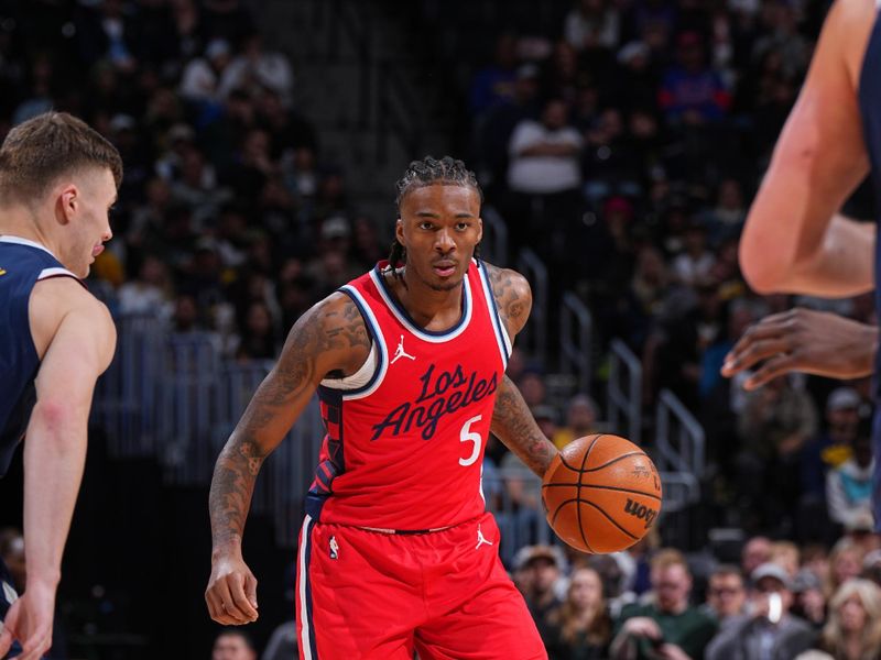 DENVER, CO - DECEMBER 13: Bones Hyland #5 of the LA Clippers dribbles the ball during the game against the Denver Nuggets on December 13, 2024 at Ball Arena in Denver, Colorado. NOTE TO USER: User expressly acknowledges and agrees that, by downloading and/or using this Photograph, user is consenting to the terms and conditions of the Getty Images License Agreement. Mandatory Copyright Notice: Copyright 2024 NBAE (Photo by Garrett Ellwood/NBAE via Getty Images)