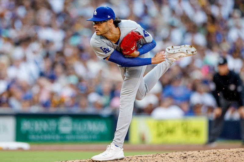 Jul 31, 2024; San Diego, California, USA; Los Angeles Dodgers relief pitcher Joe Kelly (99) pitches during the fourth inning against the Los Angeles Dodgers at Petco Park. Mandatory Credit: David Frerker-USA TODAY Sports