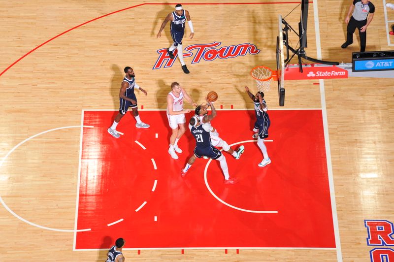 HOUSTON, TX - MARCH 31: Cam Whitmore #7 of the Houston Rockets shoots the ball during the game against the Dallas Mavericks on March 31, 2024 at the Toyota Center in Houston, Texas. NOTE TO USER: User expressly acknowledges and agrees that, by downloading and or using this photograph, User is consenting to the terms and conditions of the Getty Images License Agreement. Mandatory Copyright Notice: Copyright 2024 NBAE (Photo by Logan Riely/NBAE via Getty Images)