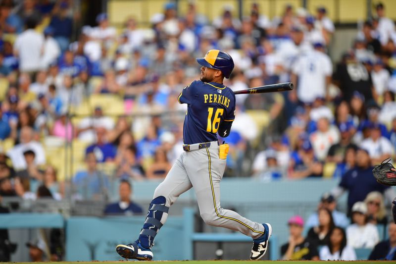 Jul 19, 2025; Los Angeles, California, USA;  Milwaukee Brewers center fielder Blake Perkins (16) hits a triple during the third inning against the Los Angeles Dodgers at Dodger Stadium. Mandatory Credit: Gary A. Vasquez-Imagn Images