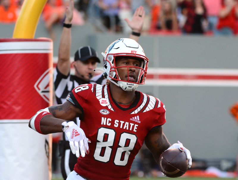 Clash at Bagwell Field: North Carolina State Wolfpack vs East Carolina Pirates in Football Showd...