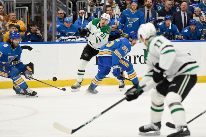 Jan 25, 2025; St. Louis, Missouri, USA; Dallas Stars left wing Jason Robertson (21) looks to pass against the St. Louis Blues during the first period at Enterprise Center. Mandatory Credit: Jeff Le-Imagn Images