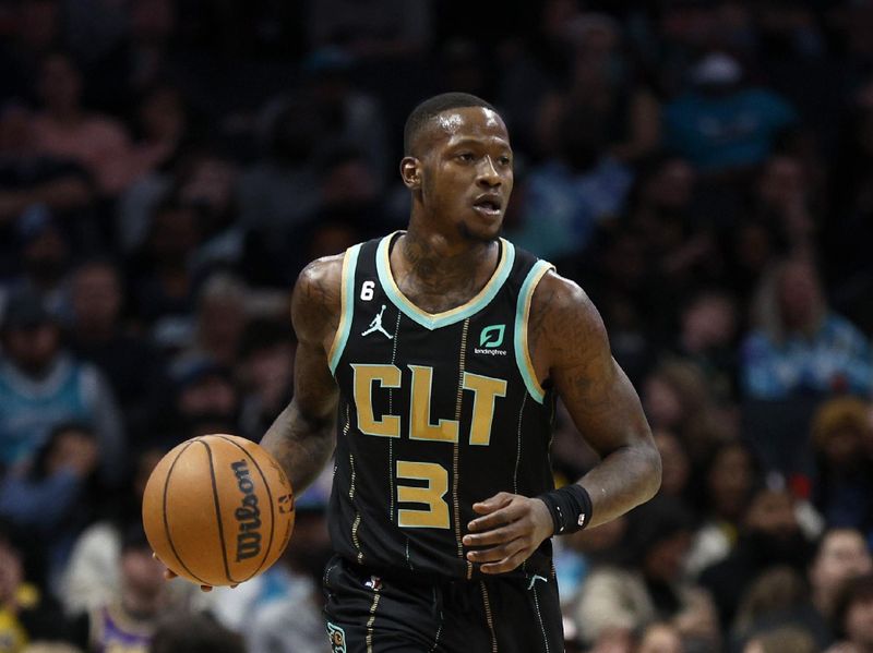 CHARLOTTE, NORTH CAROLINA - JANUARY 02: Terry Rozier #3 of the Charlotte Hornets brings the ball up court during the first quarter of the game against the Los Angeles Lakers at Spectrum Center on January 02, 2023 in Charlotte, North Carolina. NOTE TO USER: User expressly acknowledges and agrees that, by downloading and or using this photograph, User is consenting to the terms and conditions of the Getty Images License Agreement. (Photo by Jared C. Tilton/Getty Images)