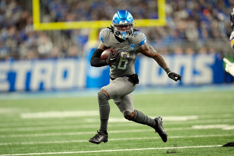 Detroit Lions running back Jahmyr Gibbs rushes during the second half of an NFL football game against the Minnesota Vikings, Sunday, Jan. 7, 2024, in Detroit. (AP Photo/Paul Sancya)