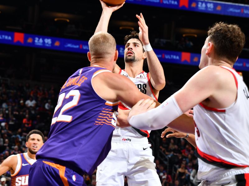 PHOENIX, AZ - NOVEMBER 2: Deni Avdija #8 of the Portland Trail Blazers drives to the basket during the game against the Phoenix Suns on November 2, 2024 at Footprint Center in Phoenix, Arizona. NOTE TO USER: User expressly acknowledges and agrees that, by downloading and or using this photograph, user is consenting to the terms and conditions of the Getty Images License Agreement. Mandatory Copyright Notice: Copyright 2024 NBAE (Photo by Barry Gossage/NBAE via Getty Images)