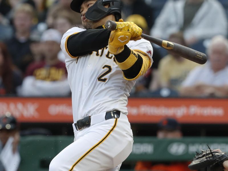 Apr 8, 2024; Pittsburgh, Pennsylvania, USA;  Pittsburgh Pirates right fielder Connor Joe (2) hits an RBI single against the Detroit Tigers during the second inning at PNC Park. Mandatory Credit: Charles LeClaire-USA TODAY Sports