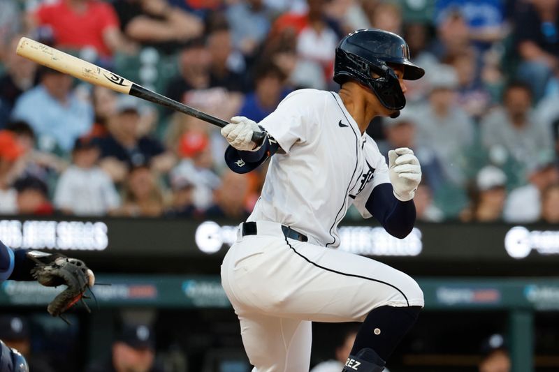 May 23, 2024; Detroit, Michigan, USA;  Detroit Tigers right fielder Wenceel Perez (46) hits an RBI single in the sixth inning against the Toronto Blue Jays at Comerica Park. Mandatory Credit: Rick Osentoski-USA TODAY Sports