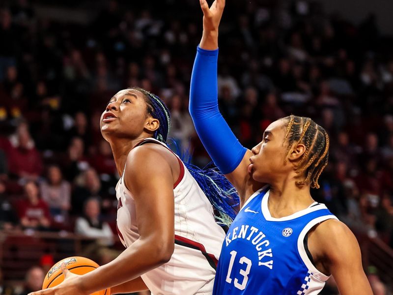 Feb 2, 2023; Columbia, South Carolina, USA; South Carolina Gamecocks forward Aliyah Boston (4) shoots over Kentucky Wildcats forward Ajae Petty (13) in the first half at Colonial Life Arena. Mandatory Credit: Jeff Blake-USA TODAY Sports