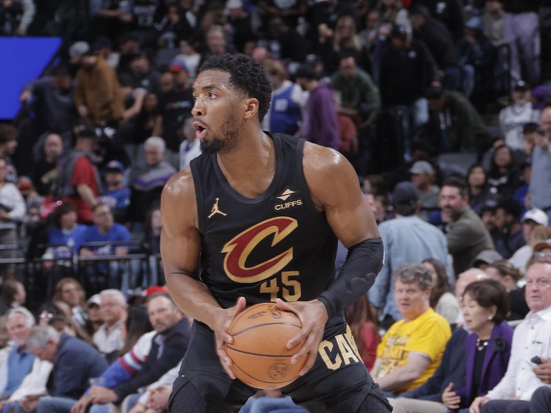 SACRAMENTO, CA - MARCH 19:   Donovan Mitchell #45 of the Cleveland Cavaliers dribbles the ball during the game against the Sacramento Kings on March 19, 2025 at Golden 1 Center in Sacramento, California. NOTE TO USER: User expressly acknowledges and agrees that, by downloading and or using this Photograph, user is consenting to the terms and conditions of the Getty Images License Agreement. Mandatory Copyright Notice: Copyright 2025 NBAE (Photo by Rocky Widner/NBAE via Getty Images)