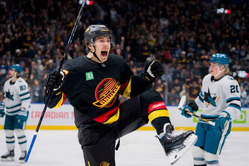 Dec 23, 2023; Vancouver, British Columbia, CAN; Vancouver Canucks forward Andrei Kuzmenko (96) celebrates his first goal of the game against the San Jose Sharks in the first period at Rogers Arena. Mandatory Credit: Bob Frid-USA TODAY Sports