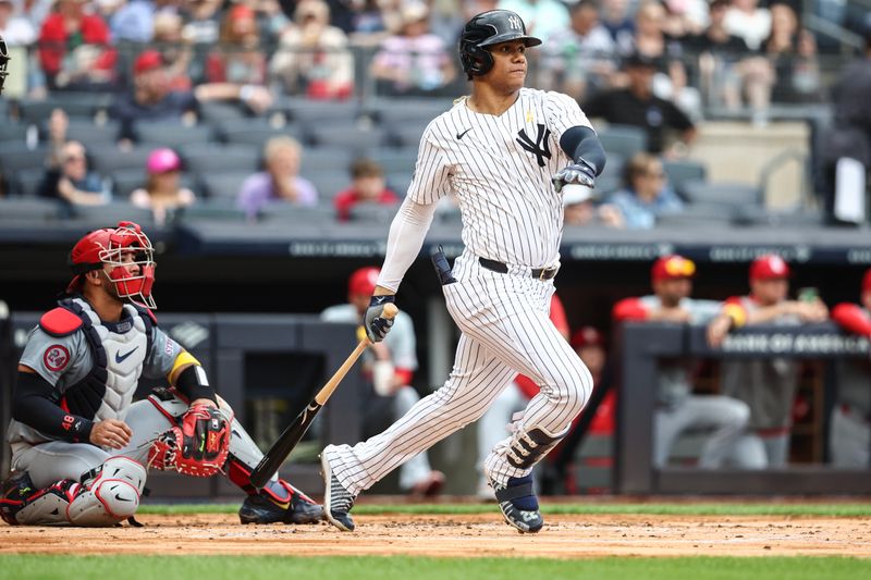 Sep 1, 2024; Bronx, New York, USA; New York Yankees right fielder Juan Soto (22) hits a single in the first inning against the St. Louis Cardinals at Yankee Stadium. Mandatory Credit: Wendell Cruz-USA TODAY Sports