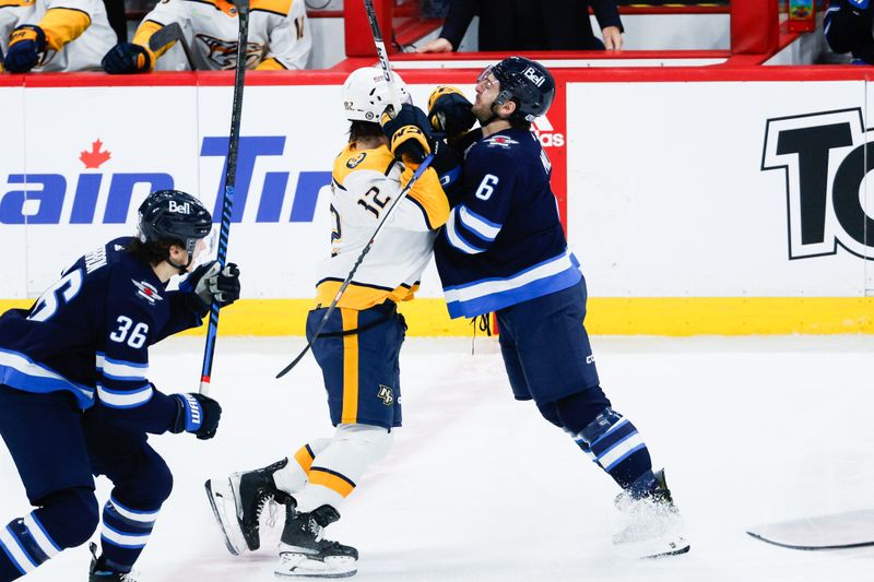 Mar 13, 2024; Winnipeg, Manitoba, CAN; Winnipeg Jets defenseman Colin Miller (6) bodies Nashville Predators forward Thomas Novak (82) during the third period at Canada Life Centre. Mandatory Credit: Terrence Lee-USA TODAY Sports