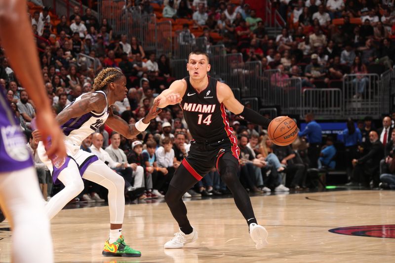 MIAMI, FL - NOVEMBER 4: Tyler Herro #14 of the Miami Heat drives to the basket during the game against the Sacramento Kings during a regular season game on November 4, 2024 at Kaseya Center in Miami, Florida. NOTE TO USER: User expressly acknowledges and agrees that, by downloading and or using this Photograph, user is consenting to the terms and conditions of the Getty Images License Agreement. Mandatory Copyright Notice: Copyright 2024 NBAE (Photo by Issac Baldizon/NBAE via Getty Images)