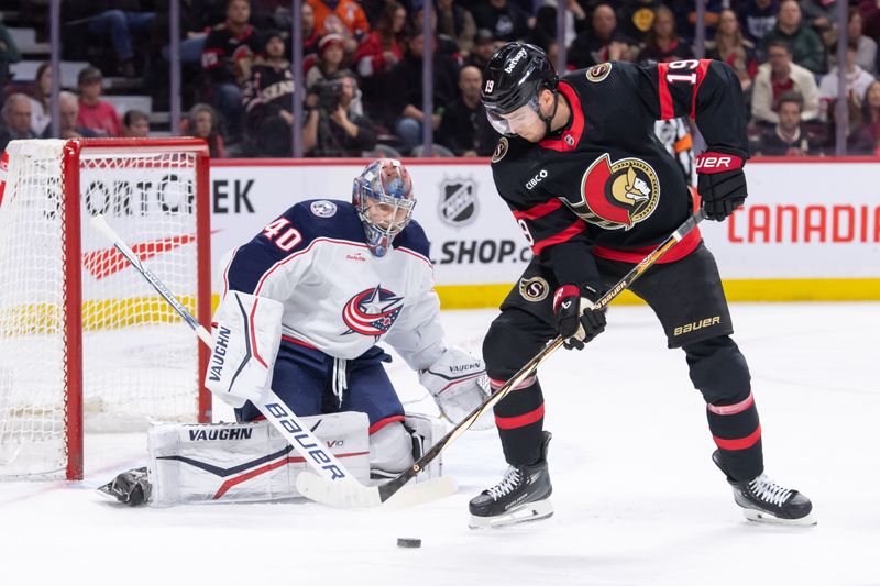 Feb 13, 2024; Ottawa, Ontario, CAN; Ottawa Senators right wing Drake Batherson (19) handles the puck in front of Columbus Blue Jackets goalie Daniil Tarasov (40) in the first period at the Canadian Tire Centre. Mandatory Credit: Marc DesRosiers-USA TODAY Sports