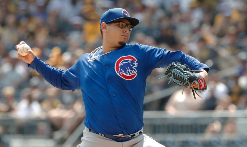 Aug 27, 2023; Pittsburgh, Pennsylvania, USA;  Chicago Cubs starting pitcher Javier Assad (72) delivers a pitch against the Pittsburgh Pirates during the first inning  at PNC Park. Mandatory Credit: Charles LeClaire-USA TODAY Sports