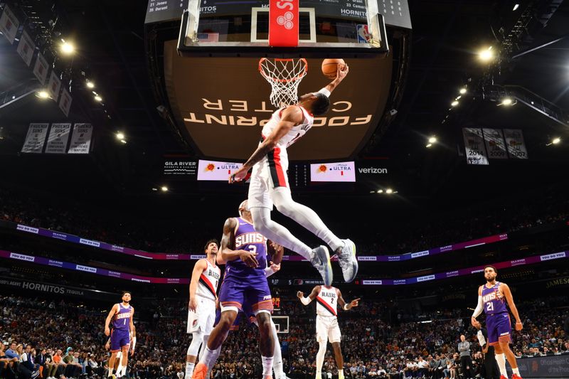 PHOENIX, AZ - NOVEMBER 2: Toumani Camara #33 of the Portland Trail Blazers drives to the basket during the game against the Phoenix Suns on November 2, 2024 at Footprint Center in Phoenix, Arizona. NOTE TO USER: User expressly acknowledges and agrees that, by downloading and or using this photograph, user is consenting to the terms and conditions of the Getty Images License Agreement. Mandatory Copyright Notice: Copyright 2024 NBAE (Photo by Barry Gossage/NBAE via Getty Images)