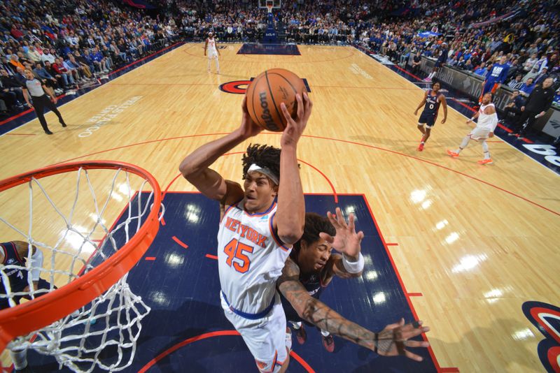 PHILADELPHIA, PA - FEBRUARY 22: Jericho Sims #45 of the New York Knicks dunks the ball during the game against the Philadelphia 76ers on February 22, 2024 at the Wells Fargo Center in Philadelphia, Pennsylvania NOTE TO USER: User expressly acknowledges and agrees that, by downloading and/or using this Photograph, user is consenting to the terms and conditions of the Getty Images License Agreement. Mandatory Copyright Notice: Copyright 2024 NBAE (Photo by Jesse D. Garrabrant/NBAE via Getty Images)