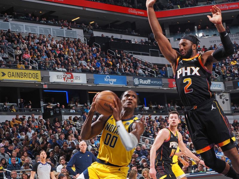 INDIANAPOLIS, IN - JANUARY 26: Bennedict Mathurin #00 of the Indiana Pacers drives to the basket during the game against the Phoenix Suns on January 26, 2024 at Gainbridge Fieldhouse in Indianapolis, Indiana. NOTE TO USER: User expressly acknowledges and agrees that, by downloading and or using this Photograph, user is consenting to the terms and conditions of the Getty Images License Agreement. Mandatory Copyright Notice: Copyright 2024 NBAE (Photo by Ron Hoskins/NBAE via Getty Images)