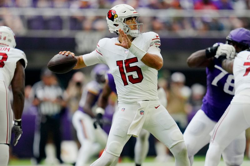 Arizona Cardinals quarterback Clayton Tune (15) throws against the Minnesota Vikings during the first half of an NFL preseason football game, Saturday, Aug. 26, 2023, in Minneapolis. (AP Photo/Abbie Parr)