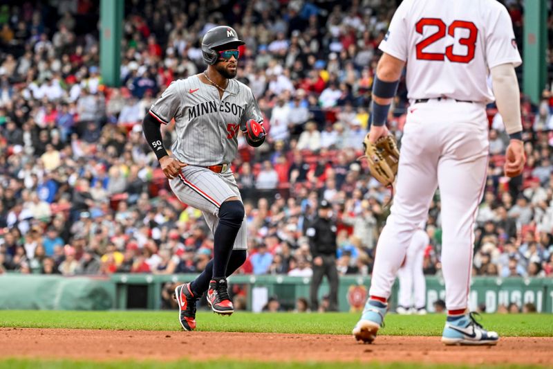 Sep 22, 2024; Boston, Massachusetts, USA; Minnesota Twins left fielder Willi Castro (50) runs to third base during the fourth inning against the Boston Red Sox at Fenway Park. Mandatory Credit: Eric Canha-Imagn Images