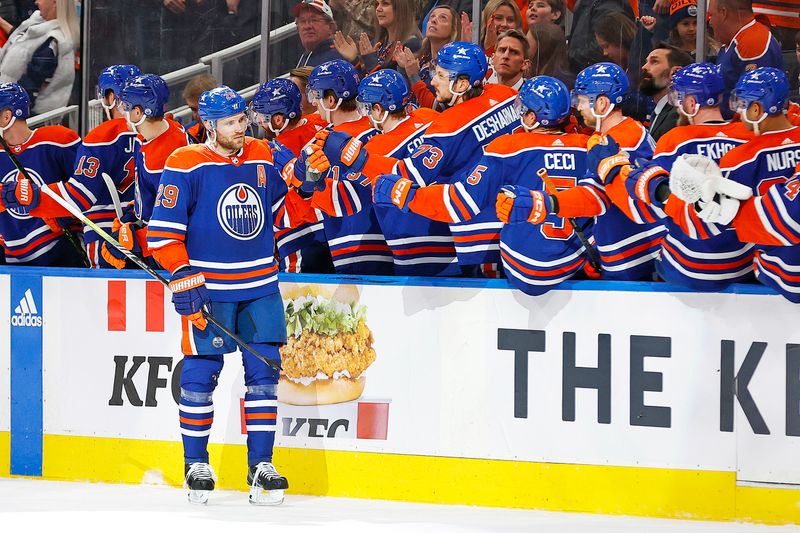 Feb 23, 2024; Edmonton, Alberta, CAN; The Edmonton Oilers celebrate a goal scored by forward Leon Draisaitl (29) during the second period against the Minnesota Wild at Rogers Place. Mandatory Credit: Perry Nelson-USA TODAY Sports