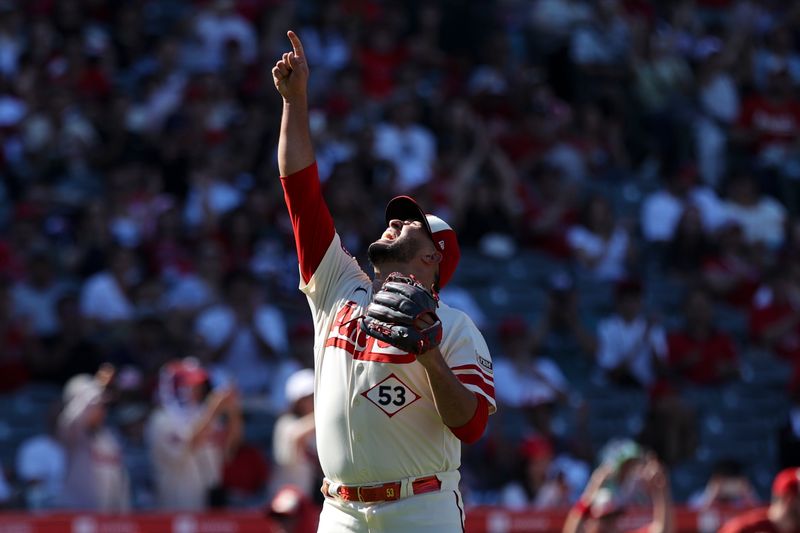 Sep 10, 2023; Anaheim, California, USA; Los Angeles Angels relief pitcher Carlos Estevez (53) reacts after the Los Angeles Angels defeat the Cleveland Guardians at Angel Stadium. Mandatory Credit: Jessica Alcheh-USA TODAY Sports