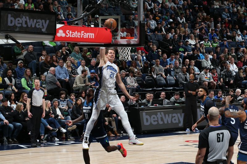 MINNEAPOLIS, MN -  FEBRUARY 2: Moritz Wagner #21 of the Orlando Magic dunks the ball during the game against the Minnesota Timberwolves on February 2, 2024 at Target Center in Minneapolis, Minnesota. NOTE TO USER: User expressly acknowledges and agrees that, by downloading and or using this Photograph, user is consenting to the terms and conditions of the Getty Images License Agreement. Mandatory Copyright Notice: Copyright 2024 NBAE (Photo by David Sherman/NBAE via Getty Images)