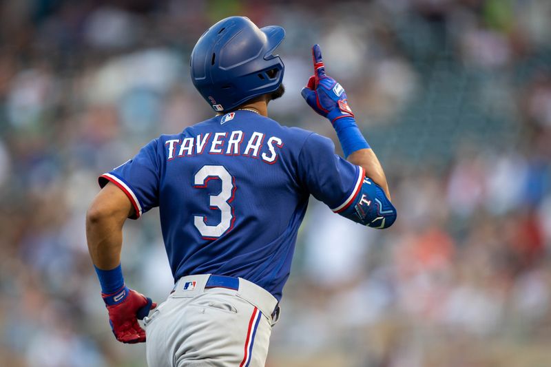 Aug 24, 2023; Minneapolis, Minnesota, USA; Texas Rangers center fielder Leody Taveras (3) celebrates after hitting a solo home run against the Minnesota Twins in the fourth inning at Target Field. Mandatory Credit: Jesse Johnson-USA TODAY Sports