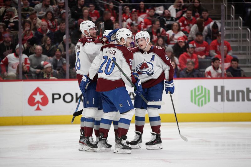 Mar 18, 2023; Detroit, Michigan, USA; Colorado Avalanche players celebrate a goal by center Lars Eller (20) during the third period against the Detroit Red Wings at Little Caesars Arena. Mandatory Credit: Brian Bradshaw Sevald-USA TODAY Sports