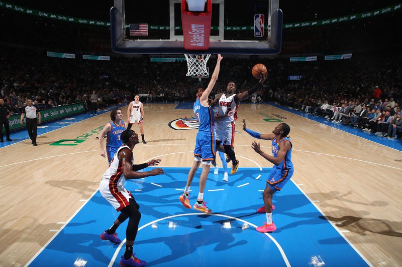 OKLAHOMA CITY, OK - MARCH 8:  Terry Rozier #2 of the Miami Heat drives to the basket during the game against the Oklahoma City Thunder on March 8, 2024 at Paycom Arena in Oklahoma City, Oklahoma. NOTE TO USER: User expressly acknowledges and agrees that, by downloading and or using this photograph, User is consenting to the terms and conditions of the Getty Images License Agreement. Mandatory Copyright Notice: Copyright 2024 NBAE (Photo by Zach Beeker/NBAE via Getty Images)