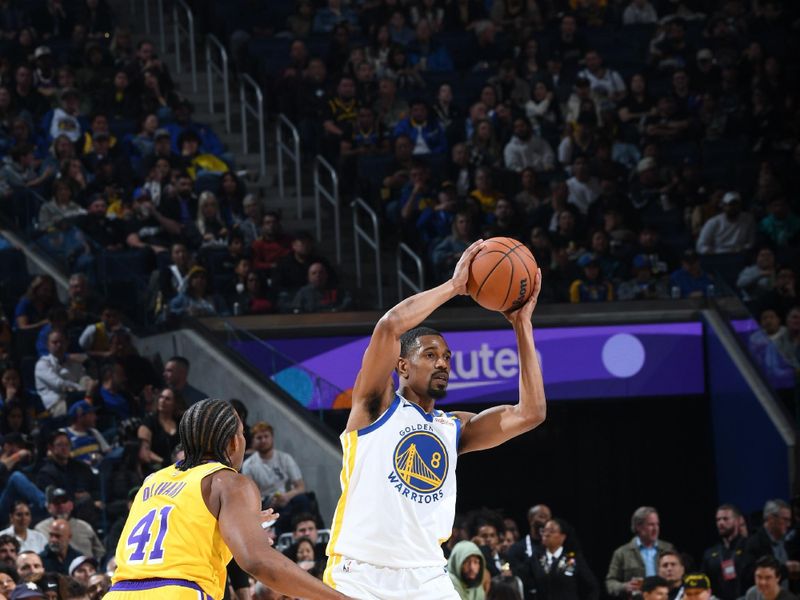 SAN FRANCISCO, CA - OCTOBER 18: De'Anthony Melton #8 of the Golden State Warriors looks to pass the ball during the game against the Los Angeles Lakers during a NBA Preseason game on October 18, 2024 at Chase Center in San Francisco, California. NOTE TO USER: User expressly acknowledges and agrees that, by downloading and or using this photograph, user is consenting to the terms and conditions of Getty Images License Agreement. Mandatory Copyright Notice: Copyright 2024 NBAE (Photo by Noah Graham/NBAE via Getty Images)