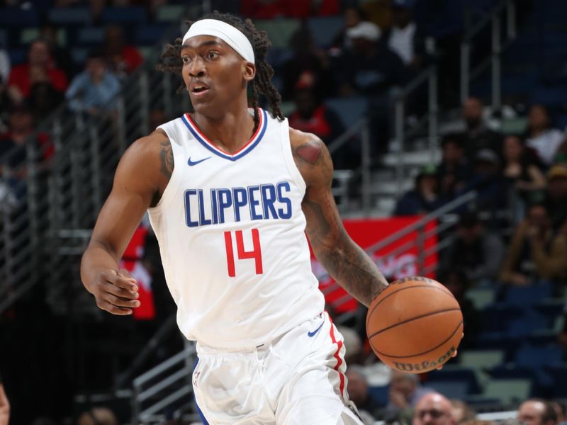 NEW ORLEANS, LA - MARCH 15: Terance Mann #14 of the LA Clippers dribbles the ball during the game against the New Orleans Pelicans on March 15, 2024 at the Smoothie King Center in New Orleans, Louisiana. NOTE TO USER: User expressly acknowledges and agrees that, by downloading and or using this Photograph, user is consenting to the terms and conditions of the Getty Images License Agreement. Mandatory Copyright Notice: Copyright 2024 NBAE (Photo by Layne Murdoch Jr./NBAE via Getty Images)