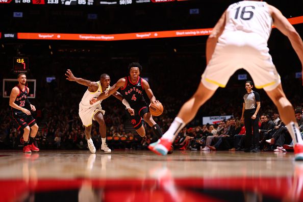 TORONTO, CANADA - DECEMBER 23:  Scottie Barnes #4 of the Toronto Raptors dribbles the ball during the game against the Utah Jazz on December 23, 2023 at the Scotiabank Arena in Toronto, Ontario, Canada.  NOTE TO USER: User expressly acknowledges and agrees that, by downloading and or using this Photograph, user is consenting to the terms and conditions of the Getty Images License Agreement.  Mandatory Copyright Notice: Copyright 2023 NBAE (Photo by Vaughn Ridley/NBAE via Getty Images)