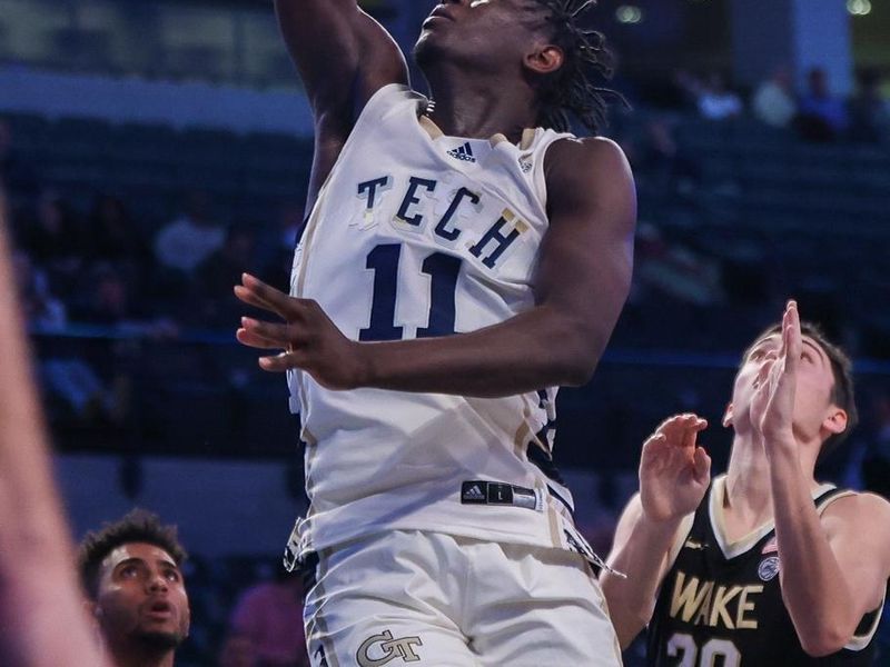 Feb 6, 2024; Atlanta, Georgia, USA; Georgia Tech Yellow Jackets forward Baye Ndongo (11) shoots against the Wake Forest Demon Deacons in the second half at McCamish Pavilion. Mandatory Credit: Brett Davis-USA TODAY Sports
