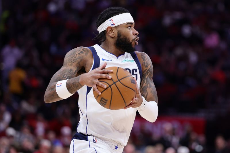 HOUSTON, TEXAS - JANUARY 01: Jaden Hardy #1 of the Dallas Mavericks handles the ball against the Houston Rockets  during the first half at Toyota Center on January 01, 2025 in Houston, Texas. NOTE TO USER: User expressly acknowledges and agrees that, by downloading and or using this photograph, User is consenting to the terms and conditions of the Getty Images License Agreement. (Photo by Alex Slitz/Getty Images)