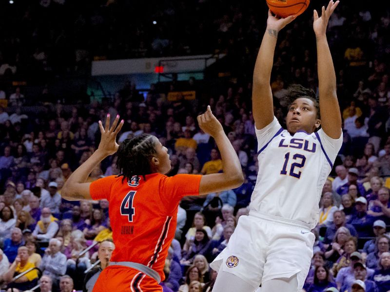 Feb 22, 2024; Baton Rouge, Louisiana, USA;  LSU Lady Tigers guard Mikaylah Williams (12) shoots over Auburn Tigers guard Kaitlyn Duhon (4) during the second half at Pete Maravich Assembly Center. Mandatory Credit: Matthew Hinton-USA TODAY Sports