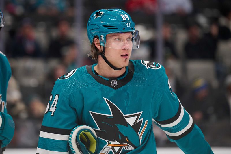 Dec 12, 2023; San Jose, California, USA; San Jose Sharks center Mikael Granlund (64) stands on the ice during a timeout against the Winnipeg Jets during the first period at SAP Center at San Jose. Mandatory Credit: Robert Edwards-USA TODAY Sports