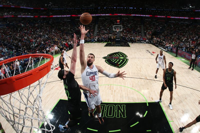 NEW ORLEANS, LA - MARCH 15: Ivica Zubac #40 of the LA Clippers shoots the ball during the game against the New Orleans Pelicans on March 15, 2024 at the Smoothie King Center in New Orleans, Louisiana. NOTE TO USER: User expressly acknowledges and agrees that, by downloading and or using this Photograph, user is consenting to the terms and conditions of the Getty Images License Agreement. Mandatory Copyright Notice: Copyright 2024 NBAE (Photo by Layne Murdoch Jr./NBAE via Getty Images)
