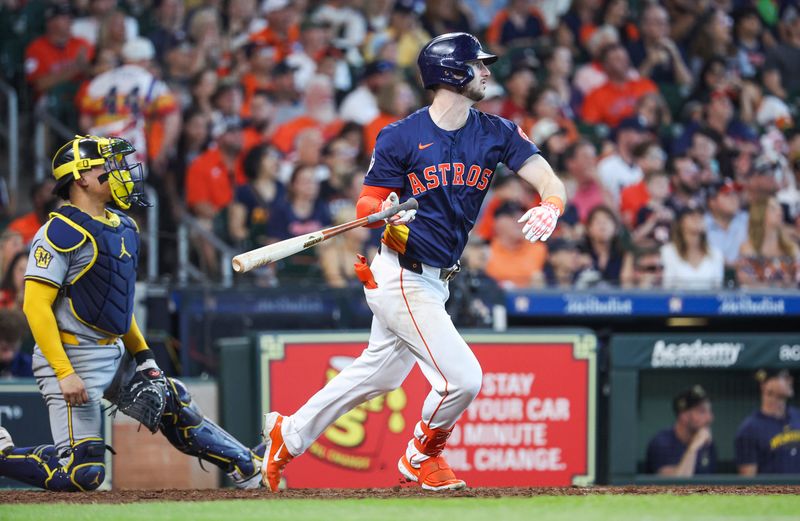 May 19, 2024; Houston, Texas, USA; Houston Astros right fielder Kyle Tucker (30) hits a three-run home run during the seventh inning against the Milwaukee Brewers at Minute Maid Park. Mandatory Credit: Troy Taormina-USA TODAY Sports