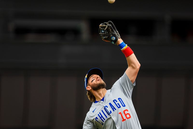 Jun 8, 2024; Cincinnati, Ohio, USA; Chicago Cubs third baseman Patrick Wisdom (16) catches a pop up hit by Cincinnati Reds shortstop Elly De La Cruz (not pictured) in the first inning at Great American Ball Park. Mandatory Credit: Katie Stratman-USA TODAY Sports