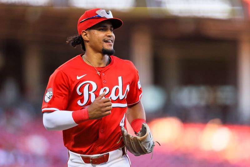 Sep 2, 2024; Cincinnati, Ohio, USA; Cincinnati Reds third baseman Santiago Espinal (4) runs off the field in the eighth inning in the game against the Houston Astros at Great American Ball Park. Mandatory Credit: Katie Stratman-USA TODAY Sports